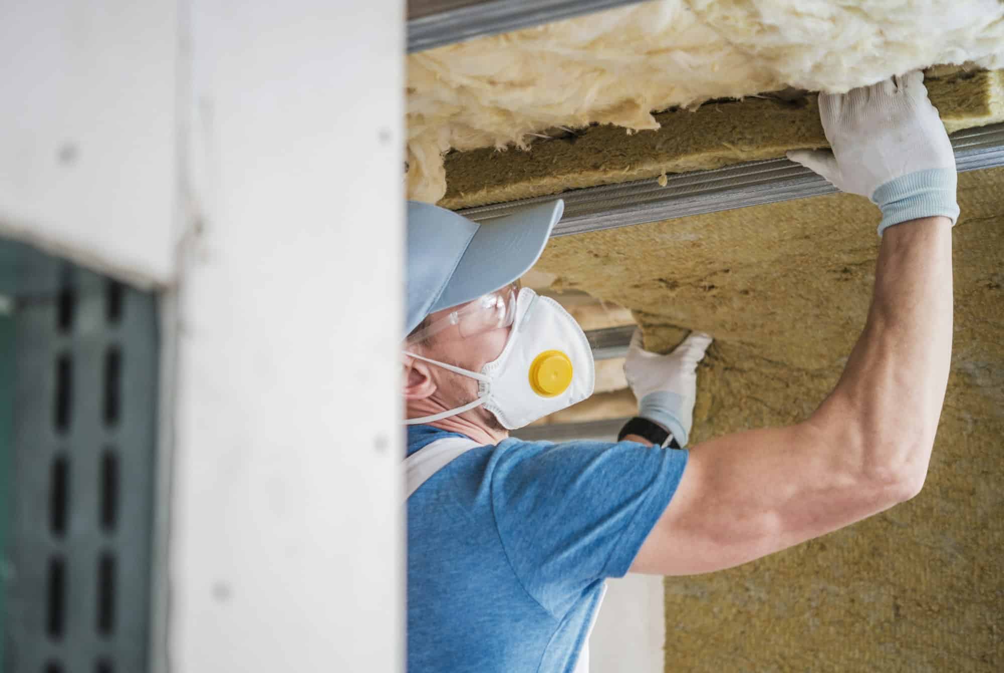 House Insulating by Worker