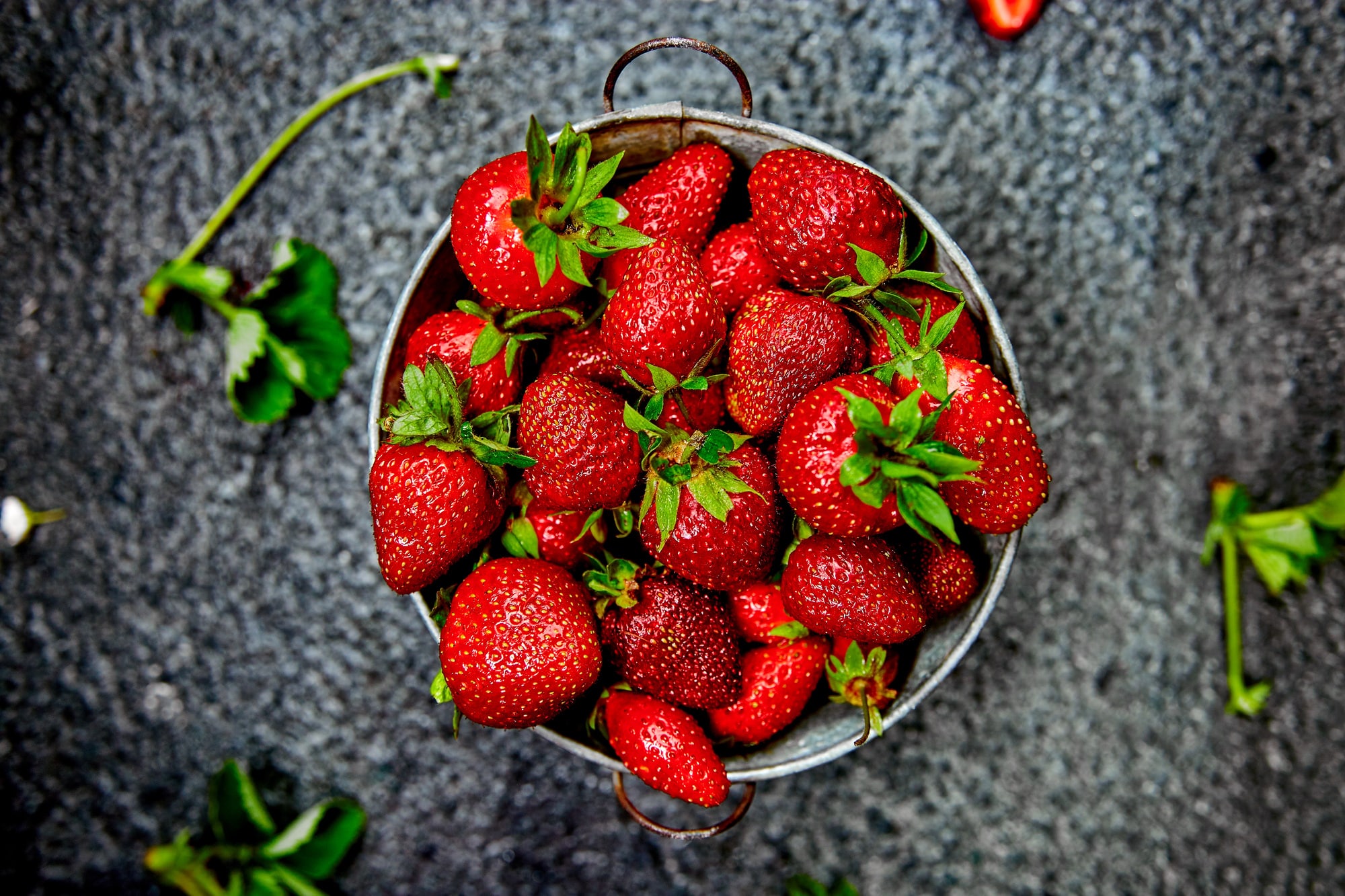 Strawberries in white basket. Fresh strawberries.